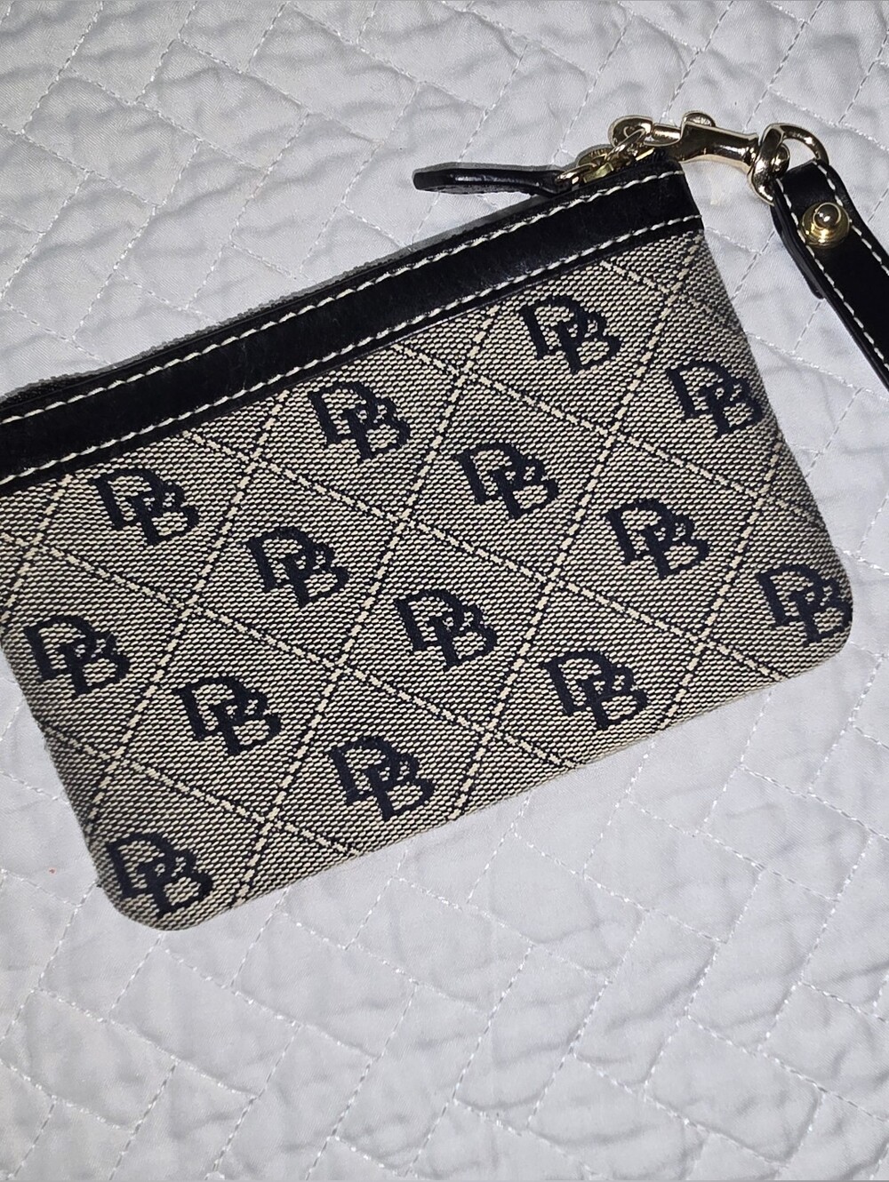 Dooney & Bourke Zip Wristlet in Beige and Black